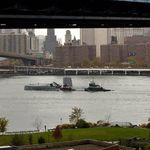 The U.S.S. Growler goes under the Manhattan Bridge.